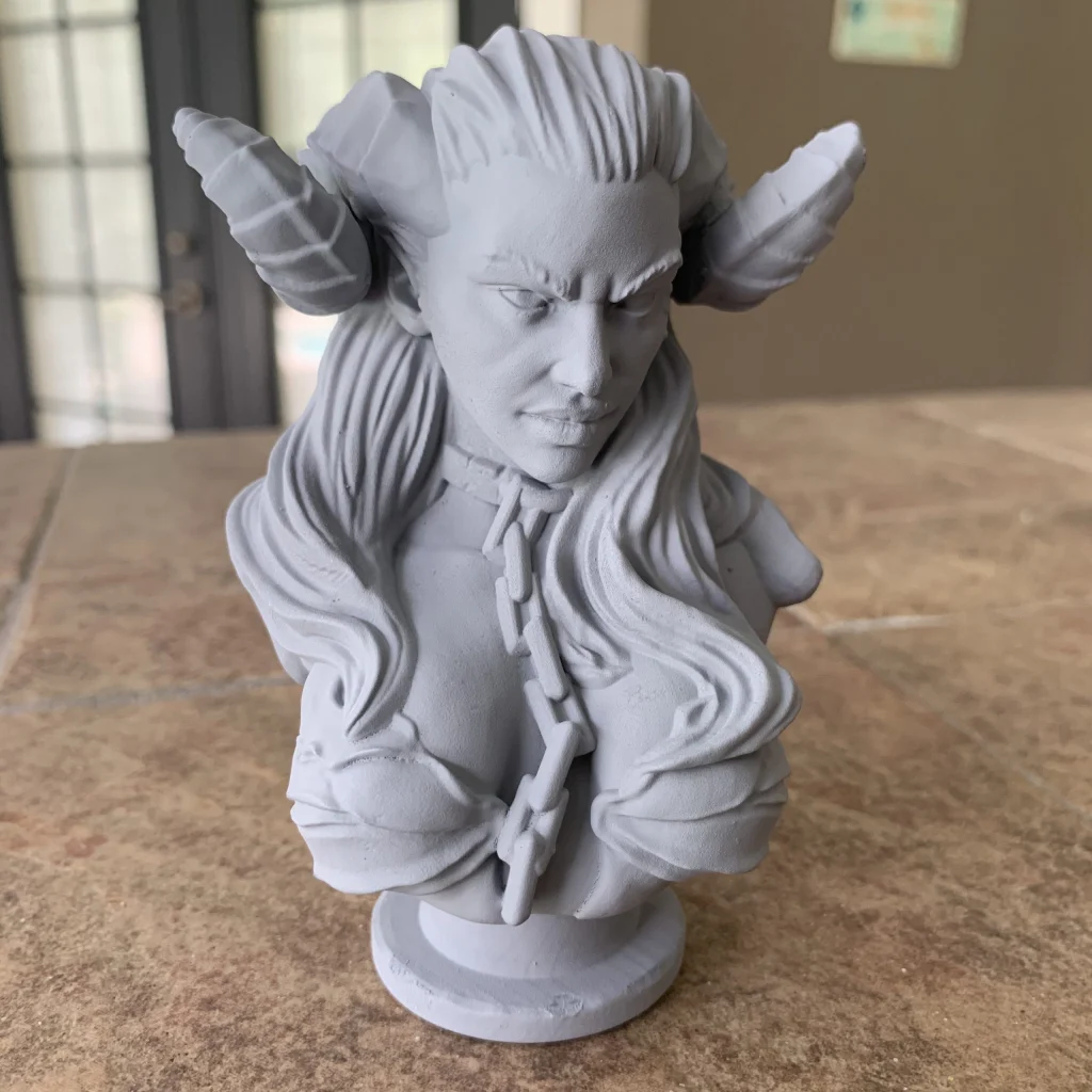 Succubus bust with horns and long hair, primed gray