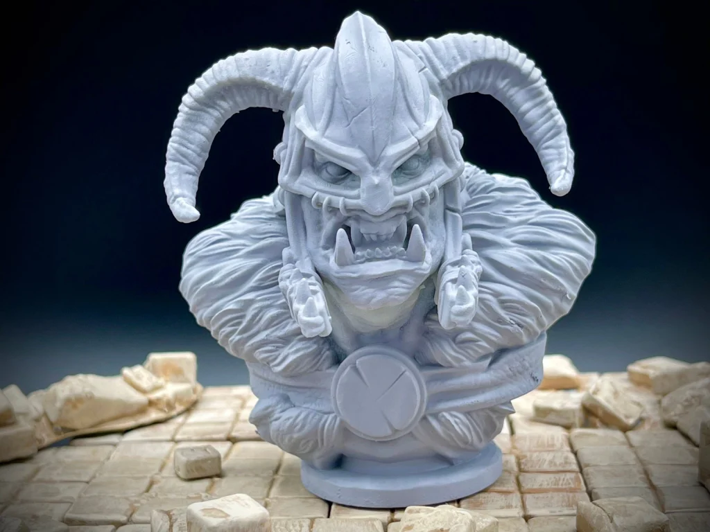 Orc war chief bust with a horned helmet and tusks, primed gray