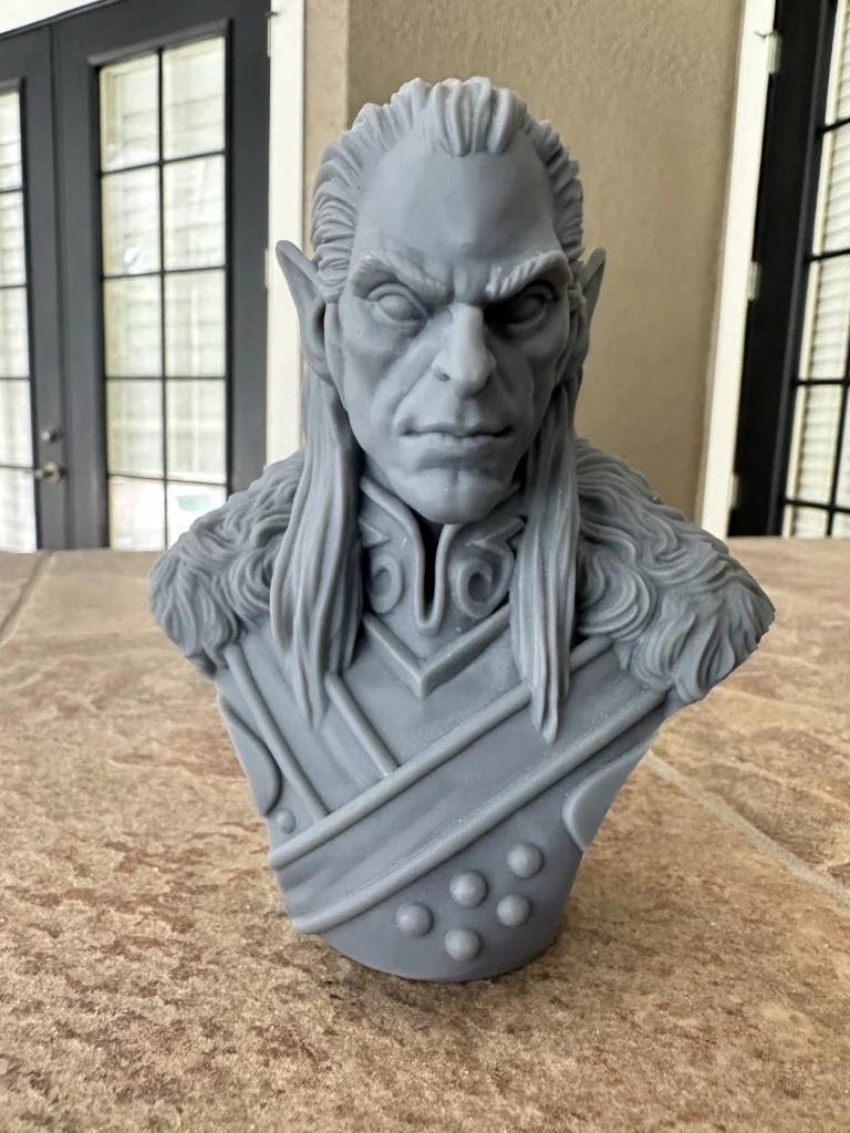 High elf bust with long hair and pointed ears, front view