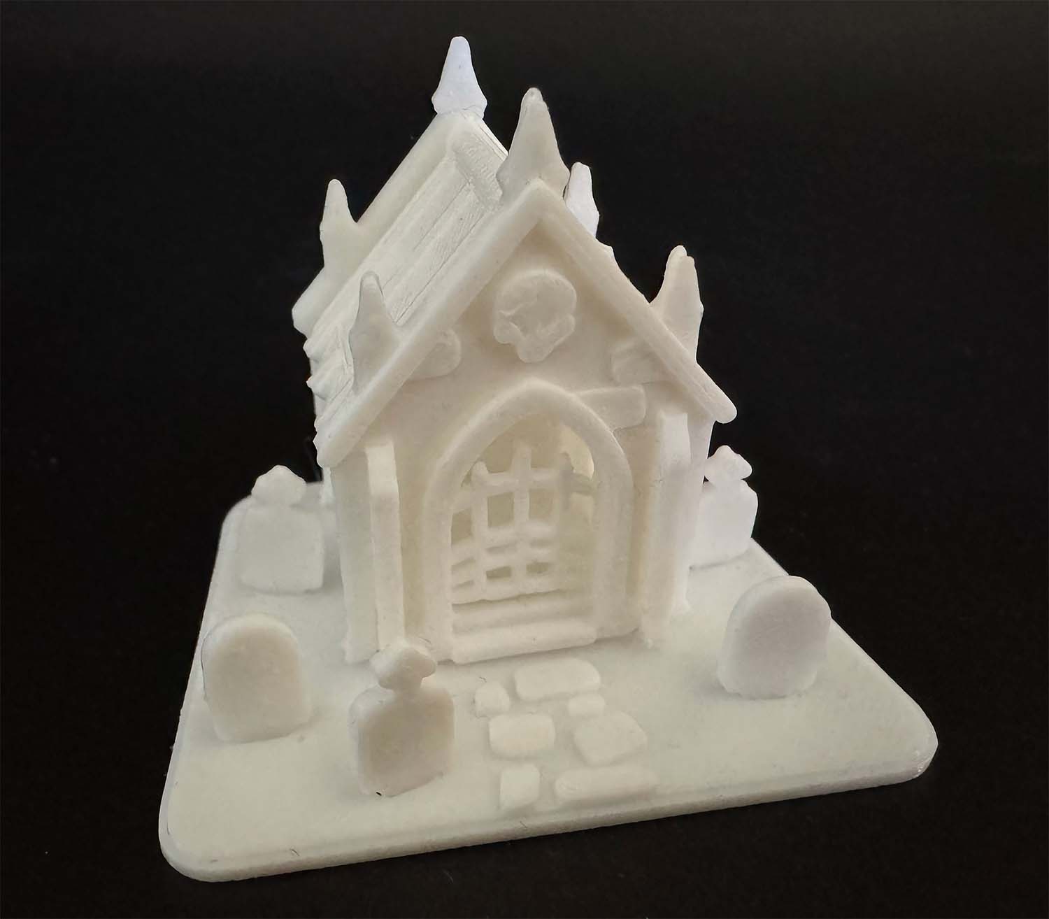 Built mausoleum model on its graveyard base with tombstones